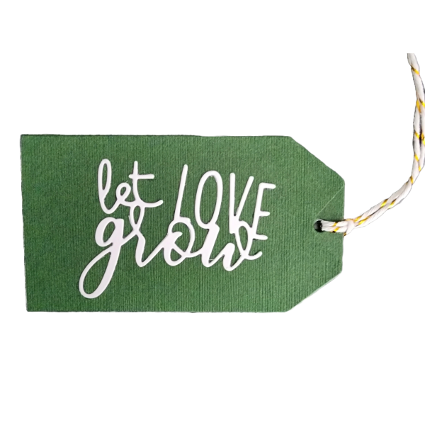 Let Love Grow Tag with Green Front and white letters, stamped with green on the back.
